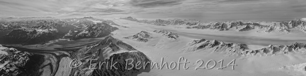 The BREATHTAKING 127mile long, 6 miles wide, and 3,000ft thick Bagley Icefields!!! Wrangell-St. Elias National Park, Alaska. I salvaged this panorama up from pictures I previously thought were unworkable. Note Mt Logan (19,850') enshrouded in clouds on the horizon and the pointy/elusive Mt. St-Elias (18,008') that marks the boundary between USA & Canada. Tana Glacier and Juniper Island in the foreground. Circa 2013.